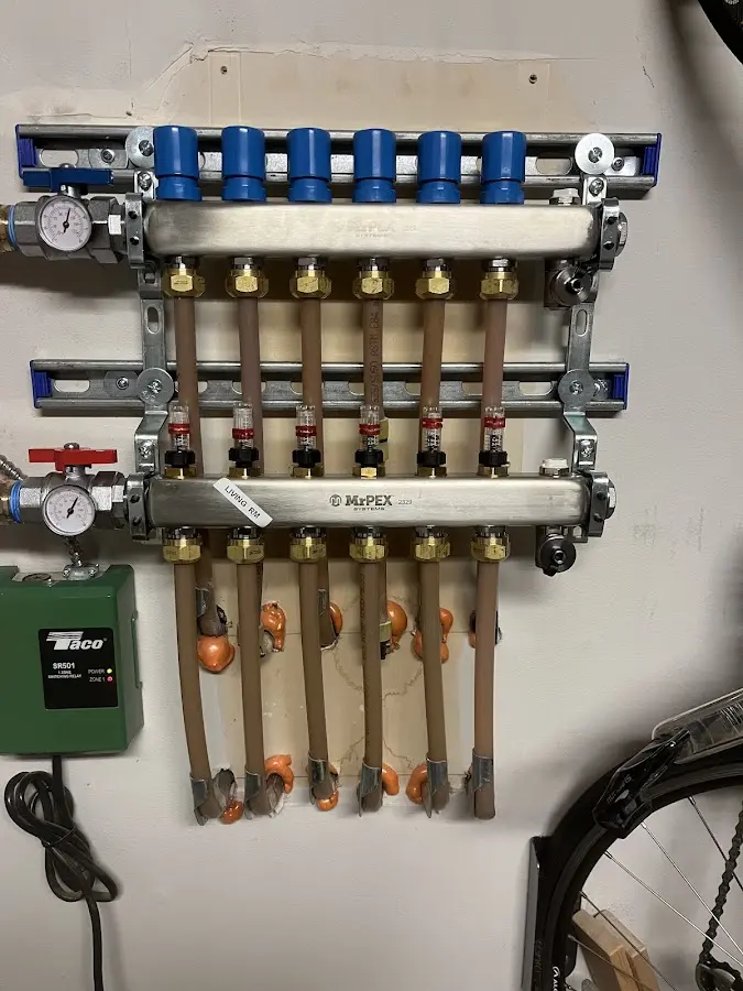 Plumber performing Water Heater Repair at a residential property in Champion Heights